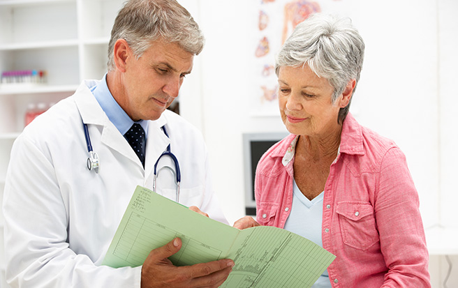 Doctor showing patient test results